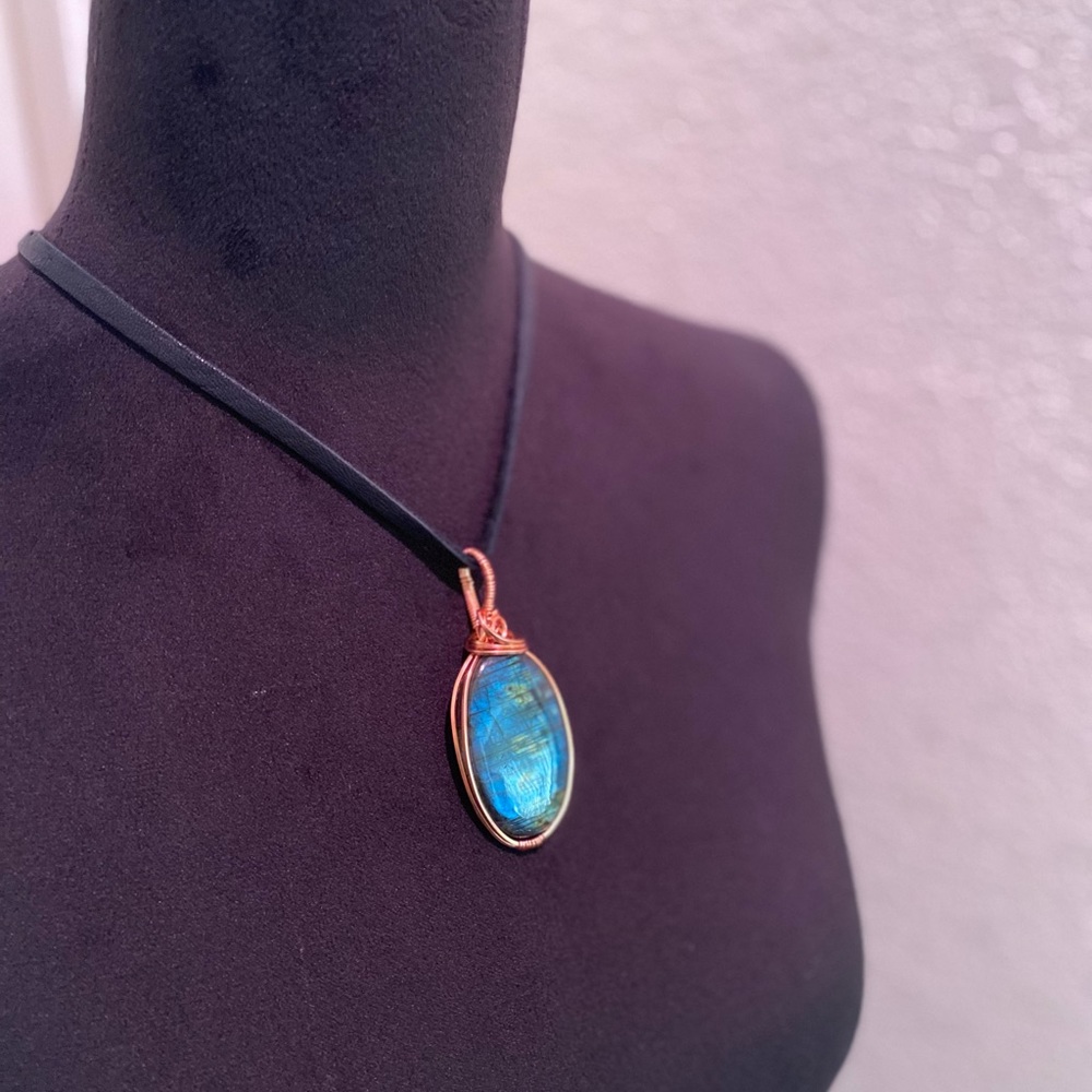 🫐 SOLD 🫐 Copper wire wrapped Labradorite crystal strung on a black deer lace.